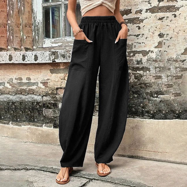 Vanna - Pantaloni fluidi a gamba larga con tasche a patta e vita elastica