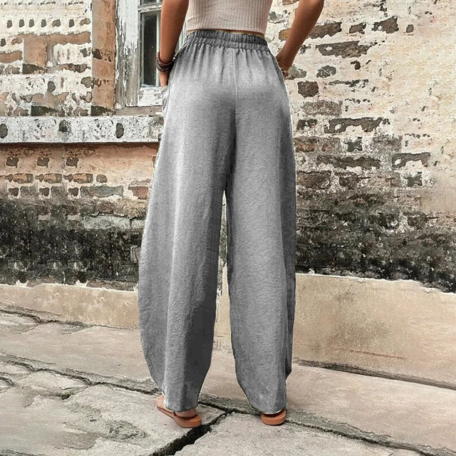 Vanna - Pantaloni fluidi a gamba larga con tasche a patta e vita elastica