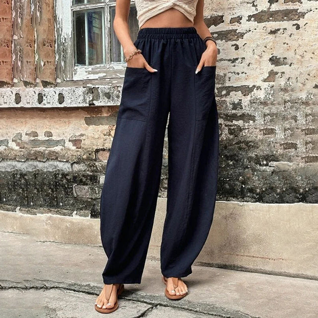 Vanna - Pantaloni fluidi a gamba larga con tasche a patta e vita elastica
