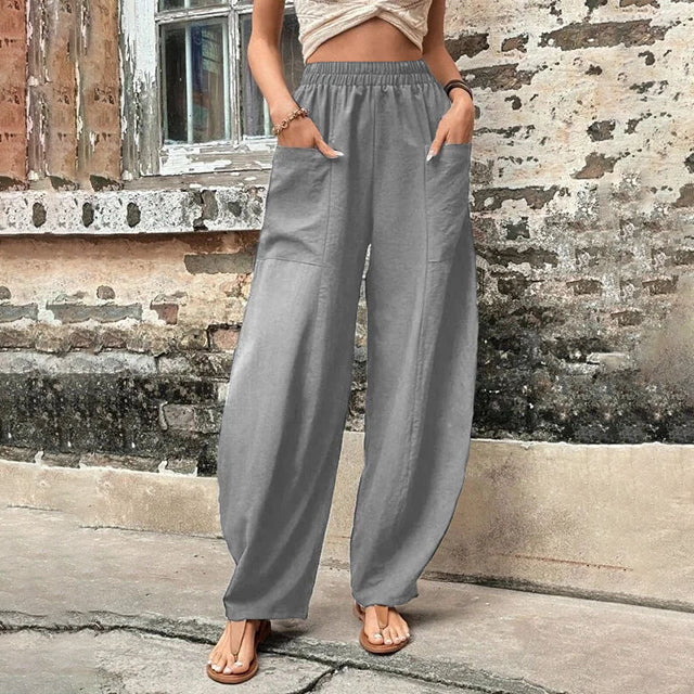 Vanna - Pantaloni fluidi a gamba larga con tasche a patta e vita elastica
