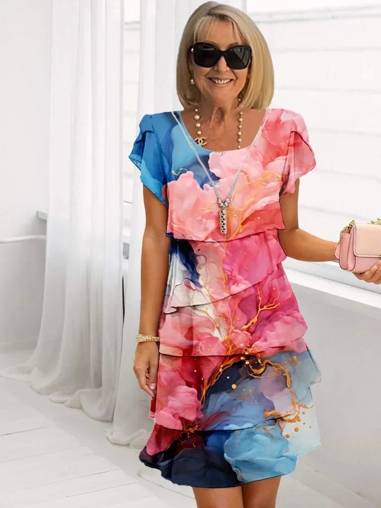 Adèle – Abito elegante fluido con volant