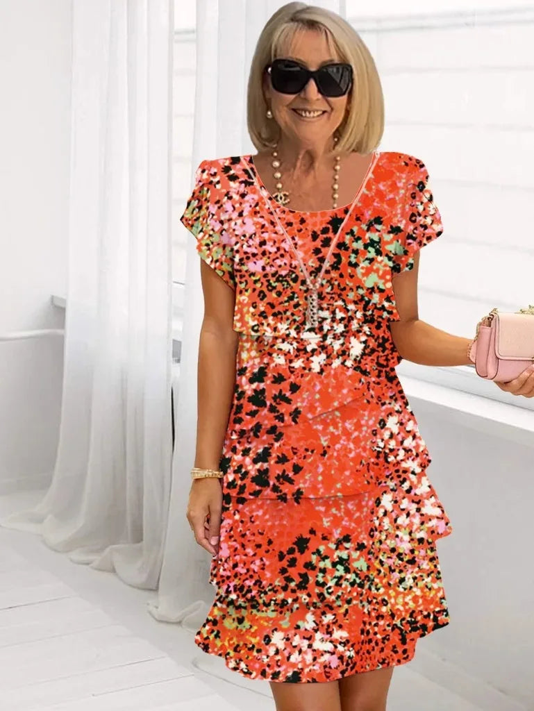Brigitte – Abito elegante fluido con volant