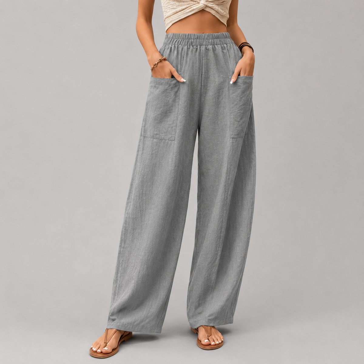 Vanna - Pantaloni fluidi a gamba larga con tasche a patta e vita elastica